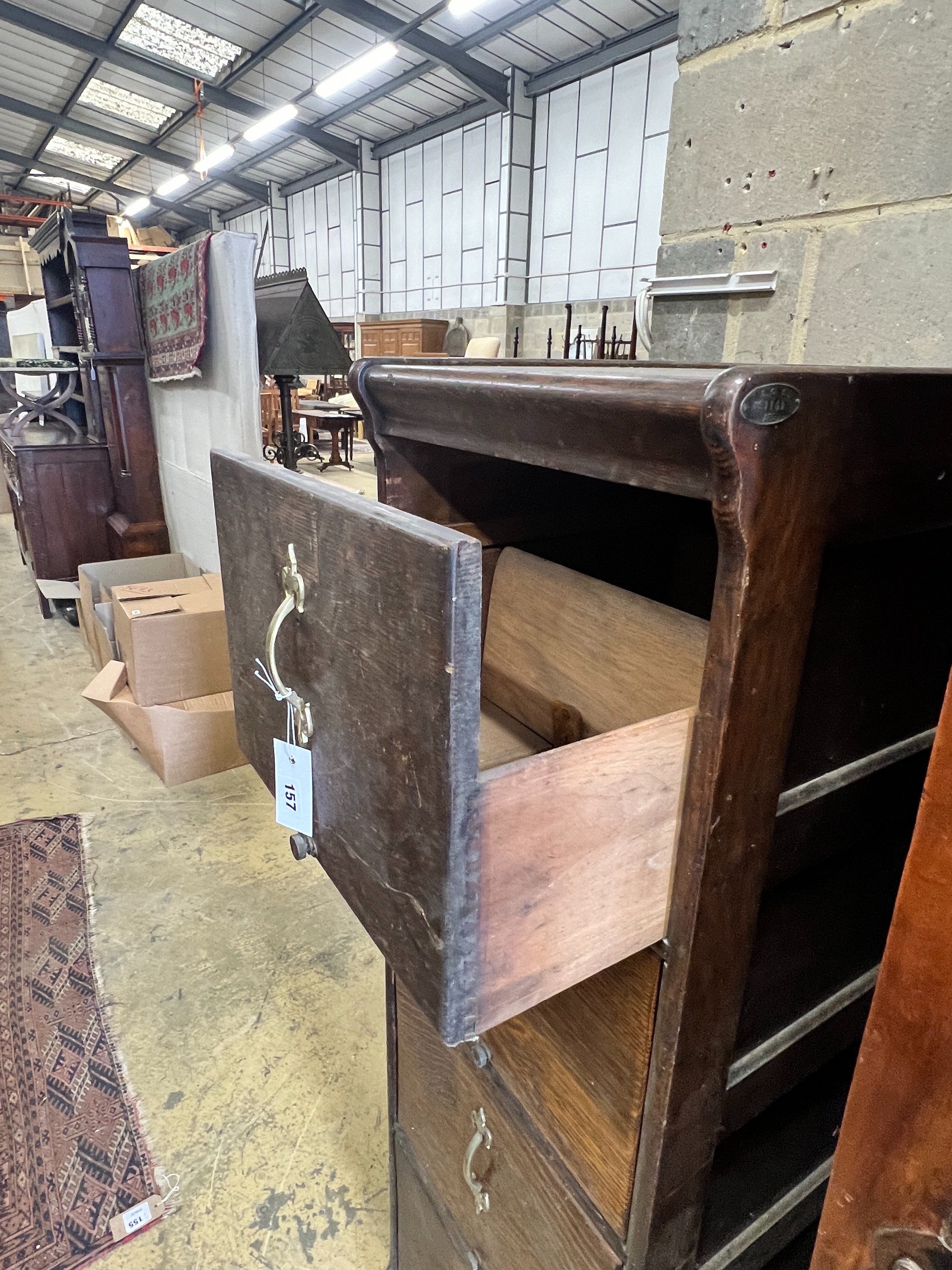 An early 20th century oak four drawer filing cabinet, width 45cm, depth 64cm, height 141cm